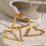 Necklace or earrings fine heart